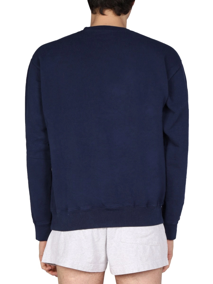 Sporty & Rich Racquet Crewneck Sweatshirt